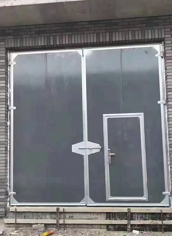 吴堡工业平开门在大型设备制造车间的应用实例